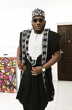 Load image into Gallery viewer, African clothing for men. Agbada men&#39;s wear. Embroidered 3 Pieces Suit for all your African themed events and more. It comes in  a shirt and pants with an overcoat. The main colors are black and white. Embroidered with a Benz symbol.
