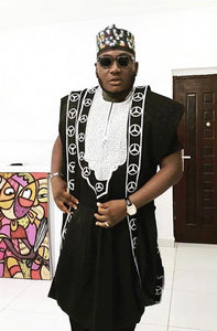 African clothing for men. Agbada men's wear. Embroidered 3 Pieces Suit for all your African themed events and more. It comes in  a shirt and pants with an overcoat. The main colors are black and white. Embroidered with a Benz symbol.